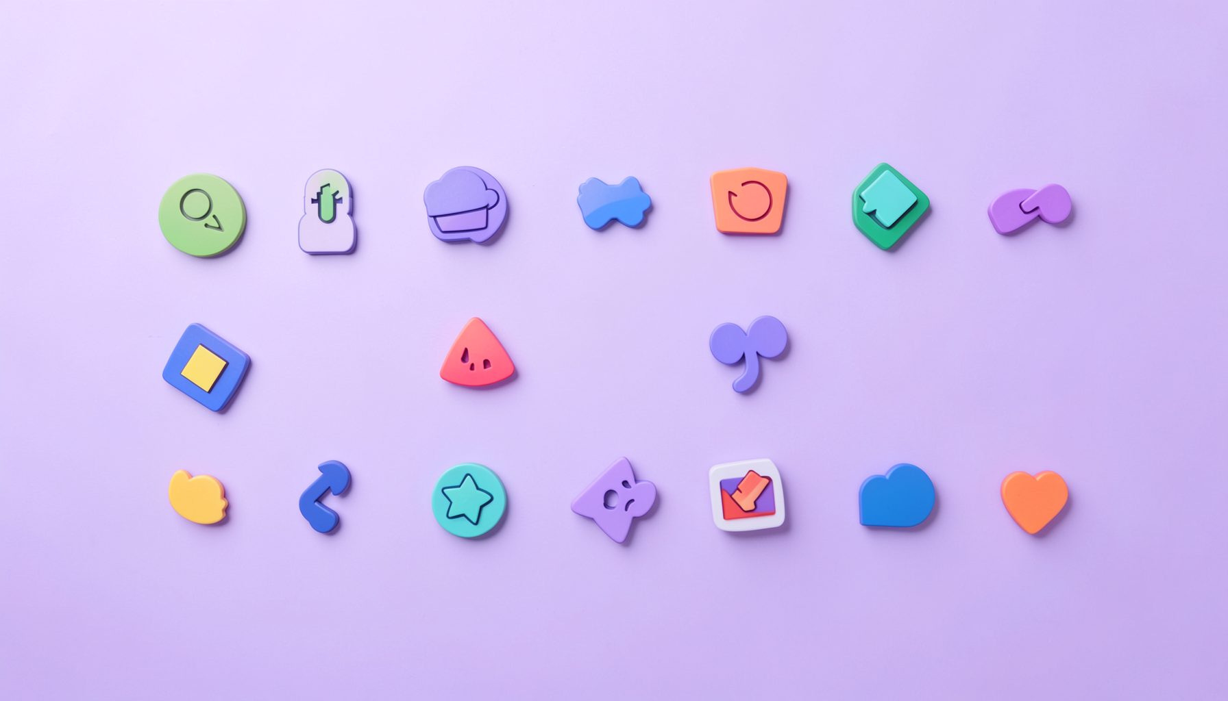 A clean flat-lay arrangement of colorful icon glyphs on a soft lavender gradient background, with subtle purple and pink accent shapes evoking a calm design workspace
